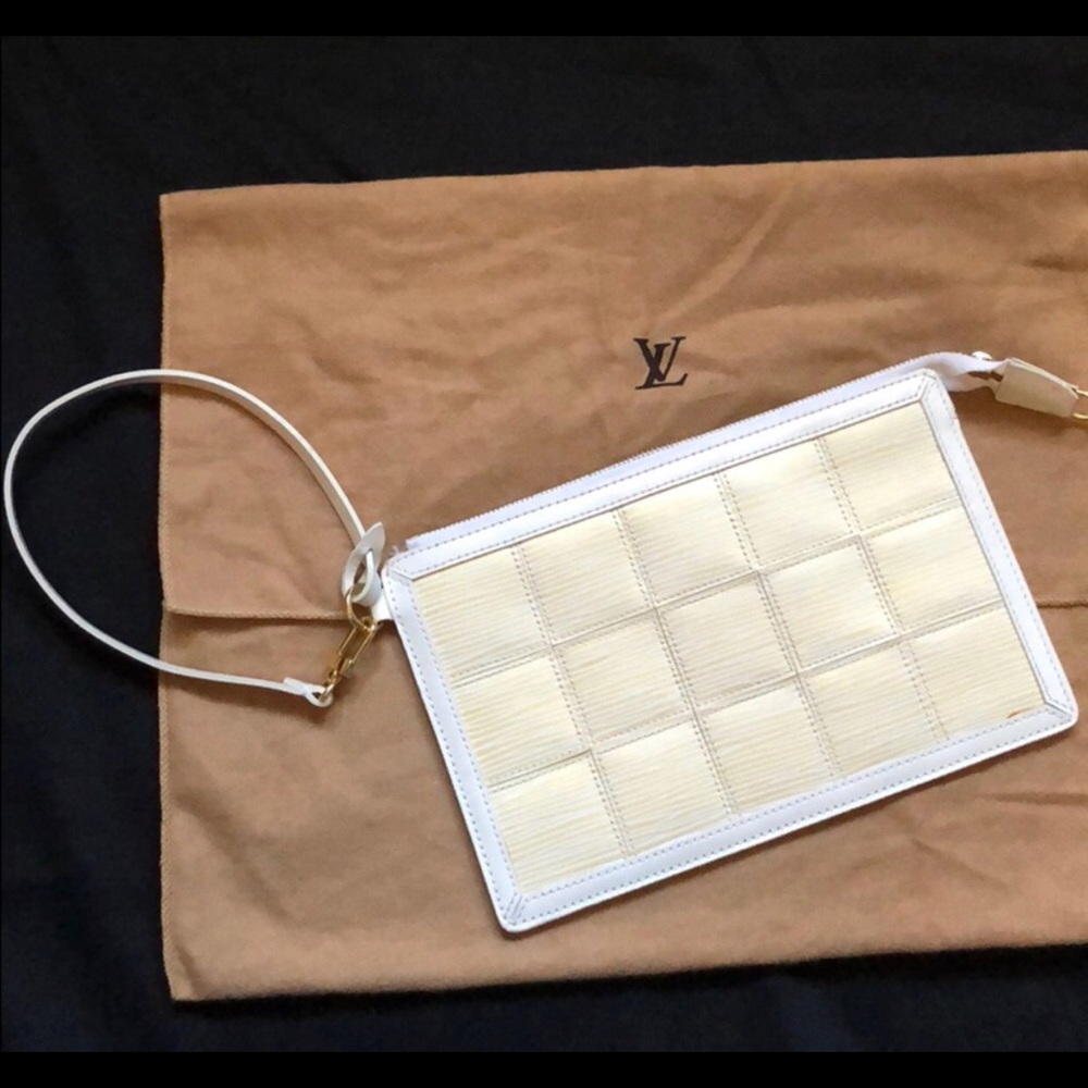 Louis Vuitton wristlet. Very cute.